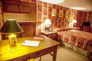 Postel nebo postele na pokoji v ubytování Hotel Boutique Casa de Orellana