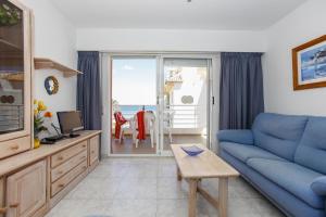 A seating area at 166 Talima C-3-A- Deniasol