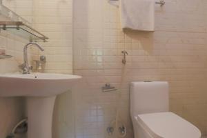 Vannituba majutusasutuses OYO 789 Hotel Shivam Plaza
