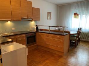 Kuchyň nebo kuchyňský kout v ubytování Hopfeld - Apartment
