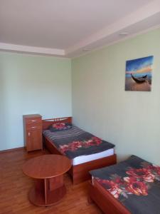 Postel nebo postele na pokoji v ubytování Family Apartment Rubini