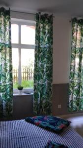 Łóżko lub łóżka w pokoju w obiekcie Apartamenty Bulwar Nadmorski, Ustka