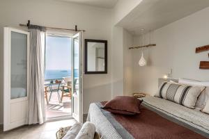 Postel nebo postele na pokoji v ubytování Grand View - Megalochori Santorini + 37 fotografií