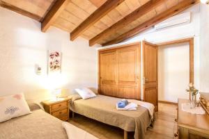 Ein Bett oder Betten in einem Zimmer der Unterkunft Fontxica