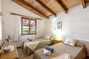 Ein Bett oder Betten in einem Zimmer der Unterkunft Fontxica