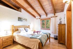Ein Bett oder Betten in einem Zimmer der Unterkunft Fontxica