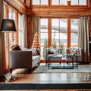 A seating area at IM WEIDACH Superior Chalets