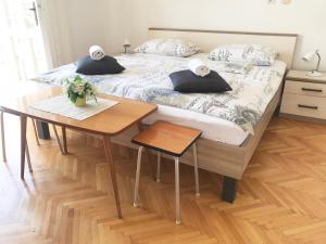 Кровать или кровати в номере Apartment & Rooms Riva