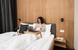 Posteľ alebo postele v izbe v ubytovaní Villa Drosera s wellnessom, Račkova dolina v Západných Tatrách