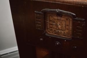 a close up of a wooden door with an electrical box at Hill Road Manor Bed & Breakfast in Grand Falls