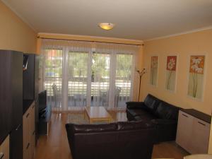Posezení v ubytování Dunalux Apartman