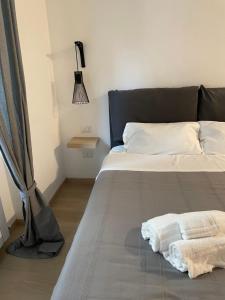 Postel nebo postele na pokoji v ubytování B&B Casarco