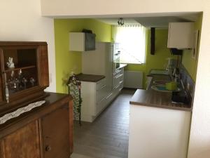 Kuchyň nebo kuchyňský kout v ubytování Haus Kim - Apartments