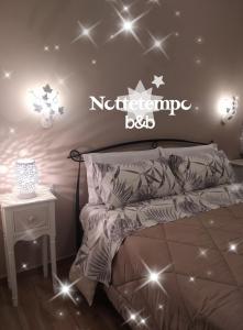 Posteľ alebo postele v izbe v ubytovaní B&B Nottetempo