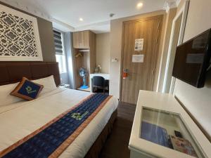 Postel nebo postele na pokoji v ubytování Pinus Hotel
