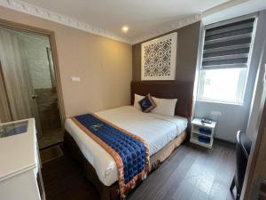 Postel nebo postele na pokoji v ubytování Pinus Hotel