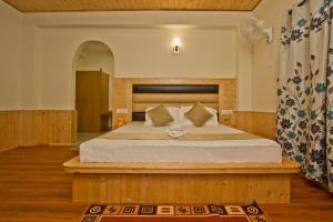 Postel nebo postele na pokoji v ubytování Hotel Rockland Inn + 37 fotografií
