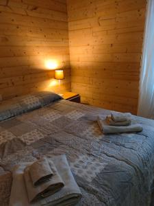 A bed or beds in a room at Piccolo Appartamento Casa Vacanze B&B Angela