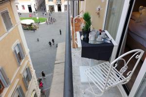 Balkón nebo terasa v ubytování HELMIRAGE PIAZZA DI SPAGNA SUITE