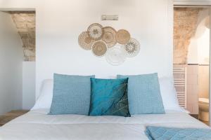 Posteľ alebo postele v izbe v ubytovaní Terrazza Ariafina by Wonderful Italy