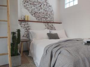 Postel nebo postele na pokoji v ubytování Huck B&B