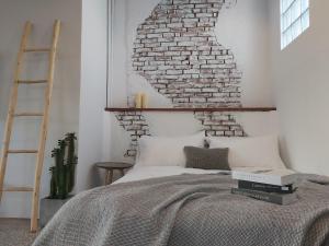 Postel nebo postele na pokoji v ubytování Huck B&B