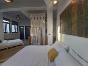 Postel nebo postele na pokoji v ubytování Huck B&B