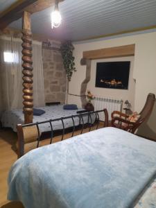 Ένα ή περισσότερα κρεβάτια σε δωμάτιο στο Casa das Freiras