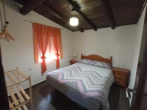A bed or beds in a room at Castillo Esmeralda Még 32 kép