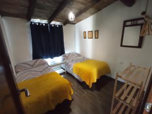 A bed or beds in a room at Castillo Esmeralda
