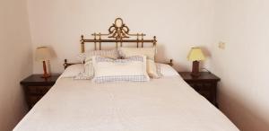 Posteľ alebo postele v izbe v ubytovaní Molino de Santos