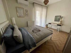 Postel nebo postele na pokoji v ubytování Διαμέρισμα στο κέντρο της Θεσσαλονίκης!