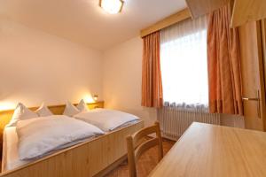 Posteľ alebo postele v izbe v ubytovaní Apartments Jasmin