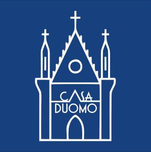 ein Bild einer Kirche mit den Worten "dumonia" in der Unterkunft Casa Duomo in Neapel