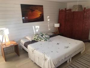 Postel nebo postele na pokoji v ubytování Chambre d’hôtes Pyla sur Mer + 17 fotografií