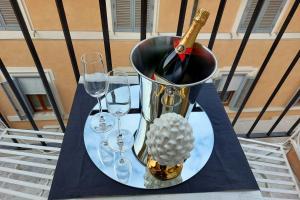 Nápoje v ubytování HELMIRAGE PIAZZA DI SPAGNA SUITE