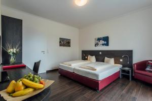 Postel nebo postele na pokoji v ubytování Hotel Bloemfontein