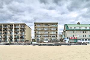 dos edificios en la playa junto a la playa en Chic Oceanfront Condo Less Than half Mi to Boardwalk!, en Ocean City