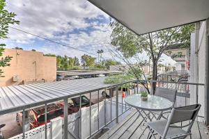 a balcony with a table and chairs on a building at Chic Scottsdale Home with Balcony, Walk to Old Town! in Scottsdale
