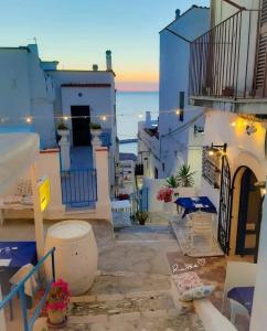 a view of a town with blue and white buildings at Casa Corallo in Peschici