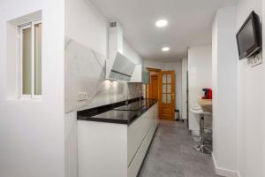 Kuchyňa alebo kuchynka v ubytovaní Apartamento Mariana Pineda Centro