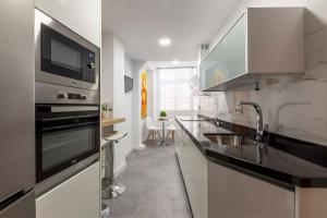 Kuchyňa alebo kuchynka v ubytovaní Apartamento Mariana Pineda Centro
