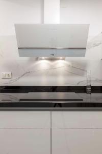 Kuchyňa alebo kuchynka v ubytovaní Apartamento Mariana Pineda Centro