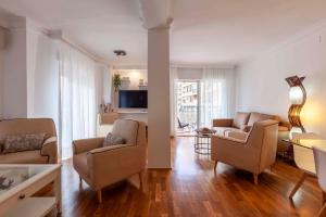 Televízia a/alebo spoločenská miestnosť v ubytovaní Apartamento Mariana Pineda Centro
