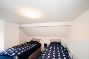 Postel nebo postele na pokoji v ubytování Ferienwohnung am Lindbruch