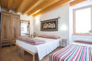 Postel nebo postele na pokoji v ubytování B&B Del Centro