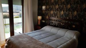 Posteľ alebo postele v izbe v ubytovaní Nuevo Hotel Sydney