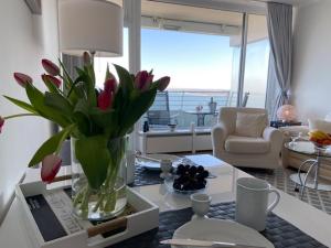 Posezení v ubytování Top - Seaside Appartement mit Meerblick