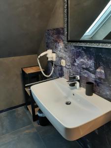 Kylpyhuone majoituspaikassa Landhotel Fuchsbau
