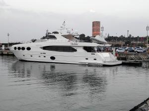 a large white boat docked in the water at La Marina Luxury Apartment Fully Furnished Free WiFi, High Standard Residence, Amazing Prime Location Close to Restaurants, Transport, Beach and Bouregreg River in Sale